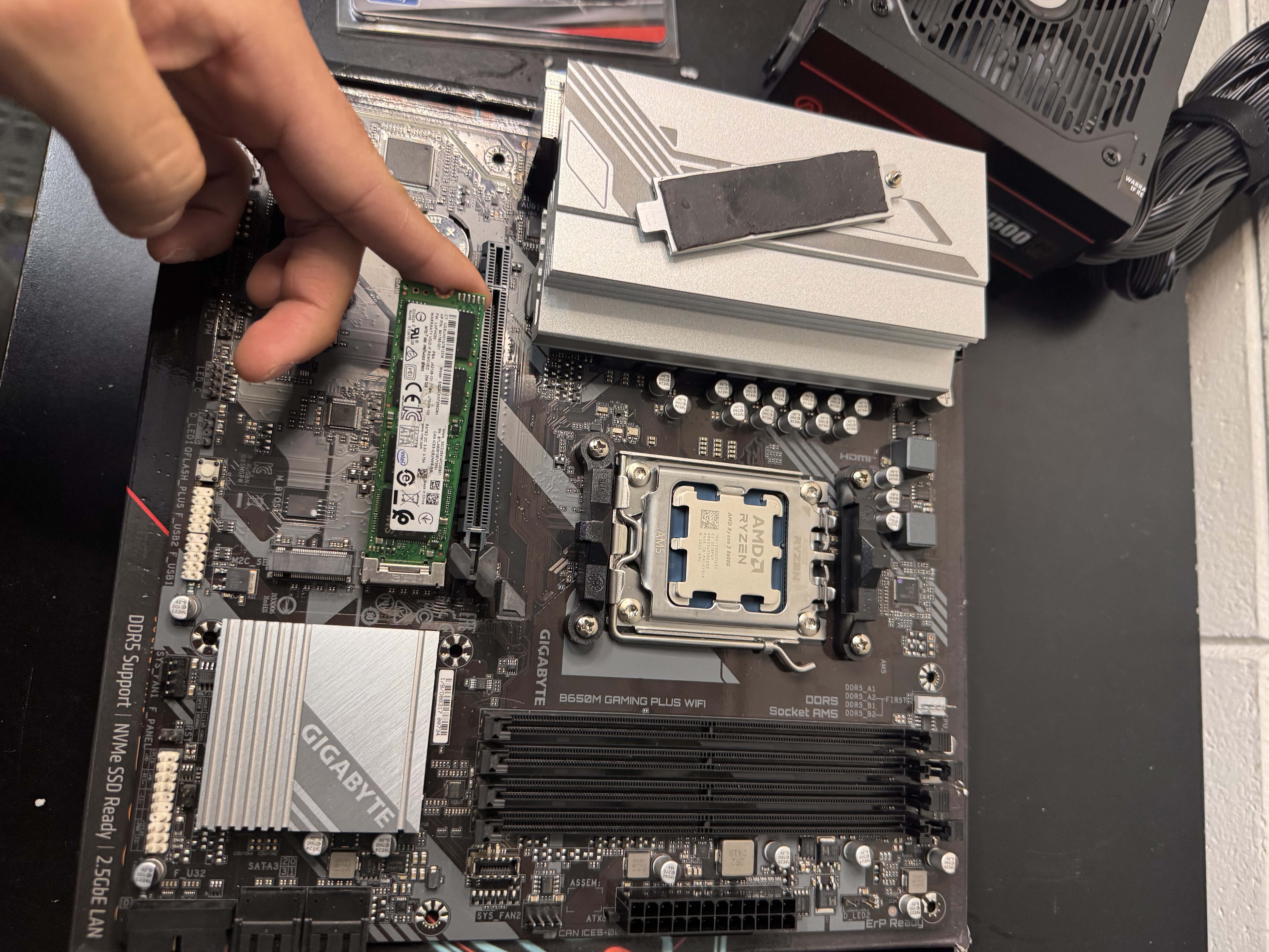 NVMe storage installation and PC parts setup on a motherboard